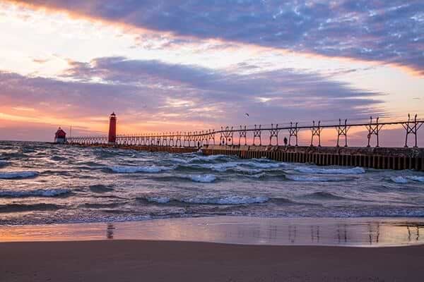 A Beautiful Sunset At The Grand Haven South Pierhead Lighthouse Michigan USA