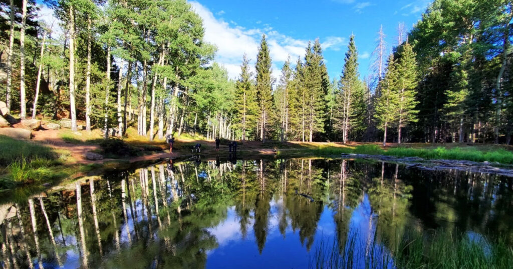 Mueller State Park campground with Pikes Peak and hiking trails in the background.
