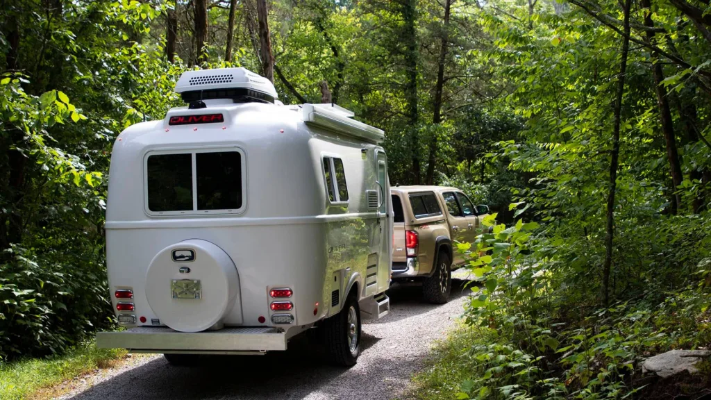 A camper in the woods.