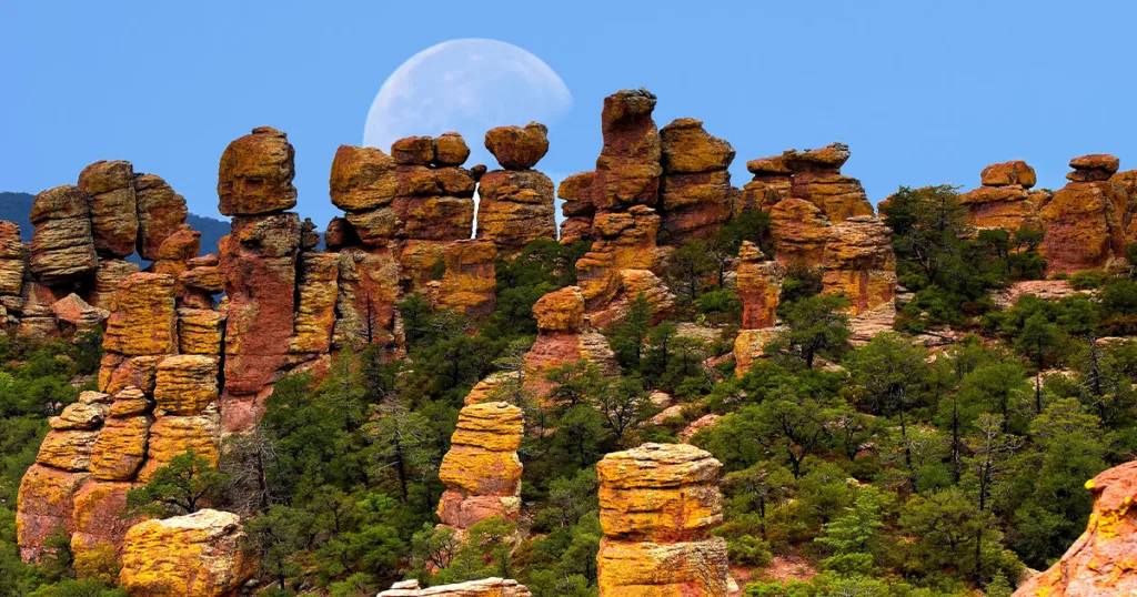 Chiricahua National Monument - dramatic rock spires and pinnacles creating a unique and striking landscape, with lush forests and vibrant wildflowers adding to the beauty of this hidden gem in southeastern Arizona.