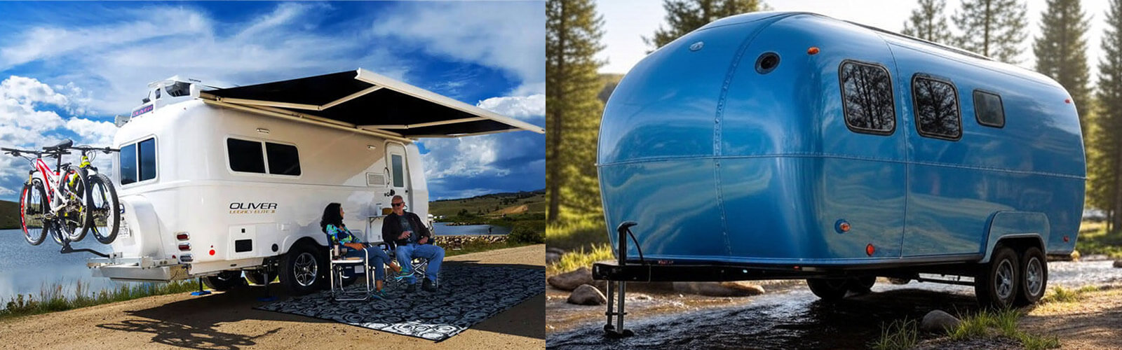 A sleek fiberglass travel trailer parked at a scenic campsite surrounded by trees and mountains under a clear blue sky.