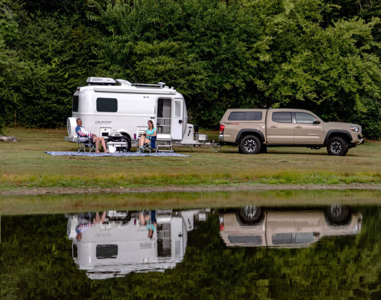 A couple purchased their Travel Trailer and went camping near a lake