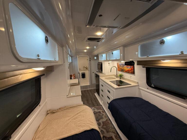 Interior of a compact RV trailer ideal for luxury camping adventures