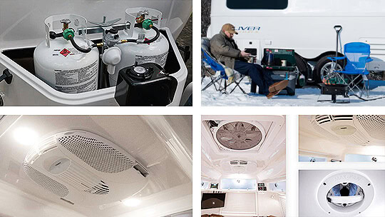 Exterior of Oliver Elite II travel trailer featuring two 20-lb propane tanks, roof-mounted Dometic air conditioner, and MaxxFan ventilation system