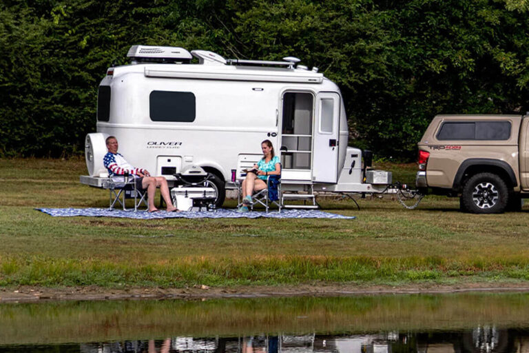 Oliver travel trailer at a camping site